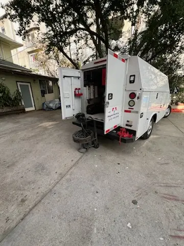 Magnet Plumbing service vehicle on-site for Grease Trap Cleaning in Dana Point